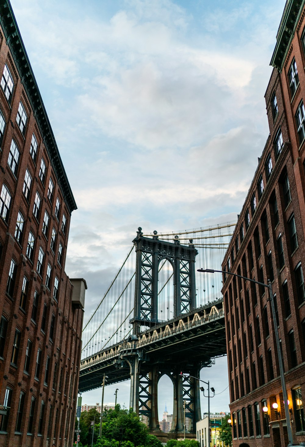 brown building near gray concrete bridge