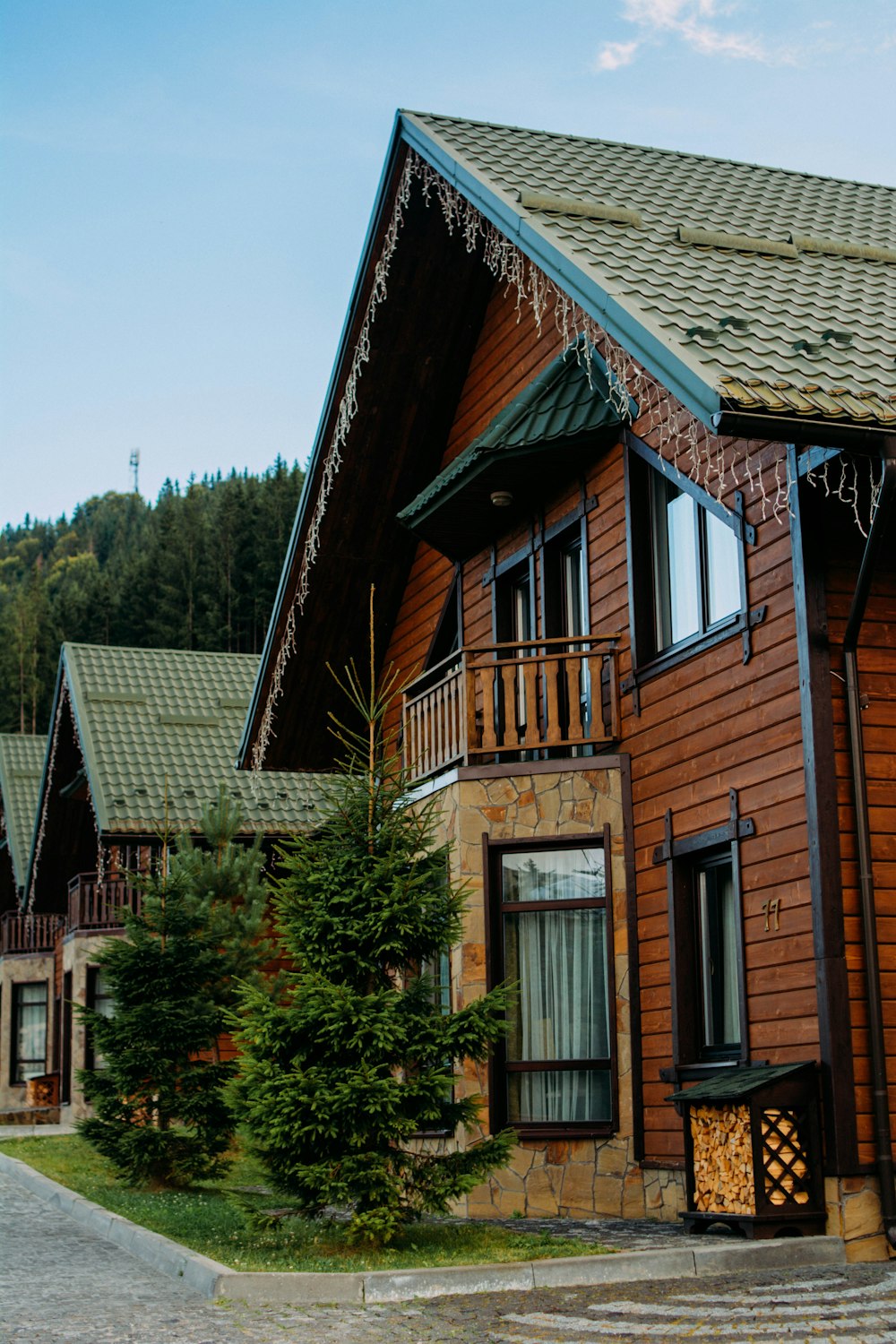 brown wooden 2-storey house