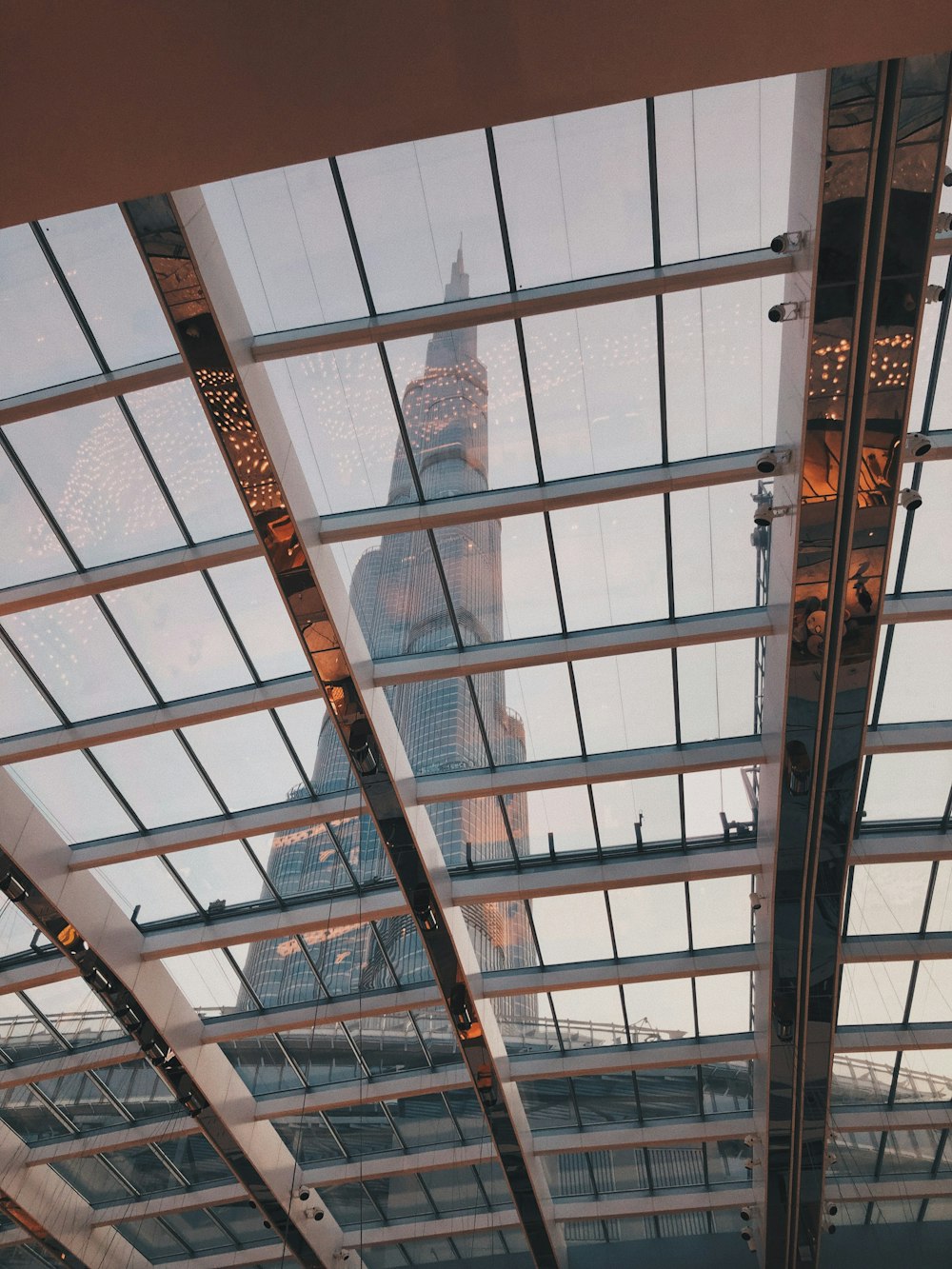 low-angle photography of building glass roof
