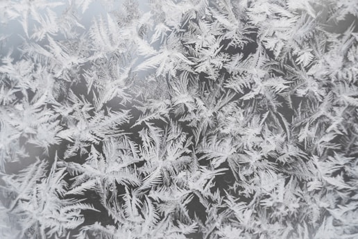 a close up of a frosty window