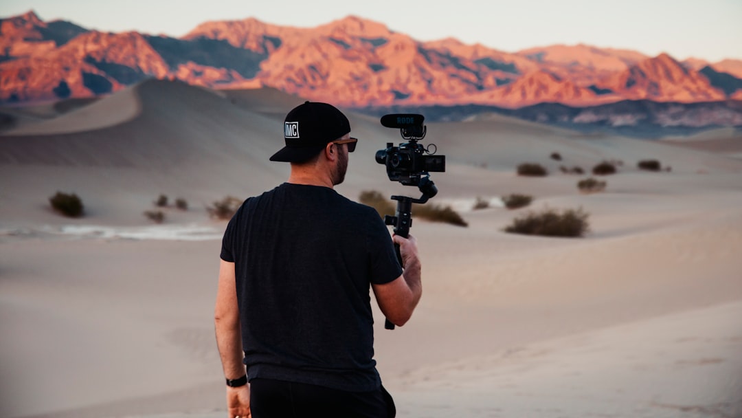 man with gimbal in desert
