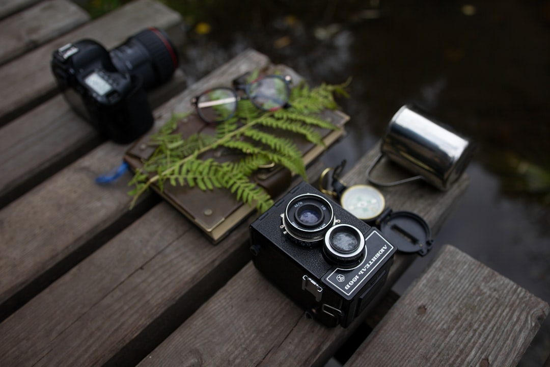 camera beside book