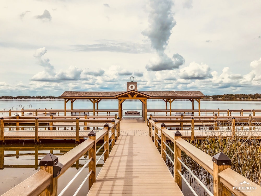 brown wooden dock on sea