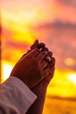 two person holding hands
