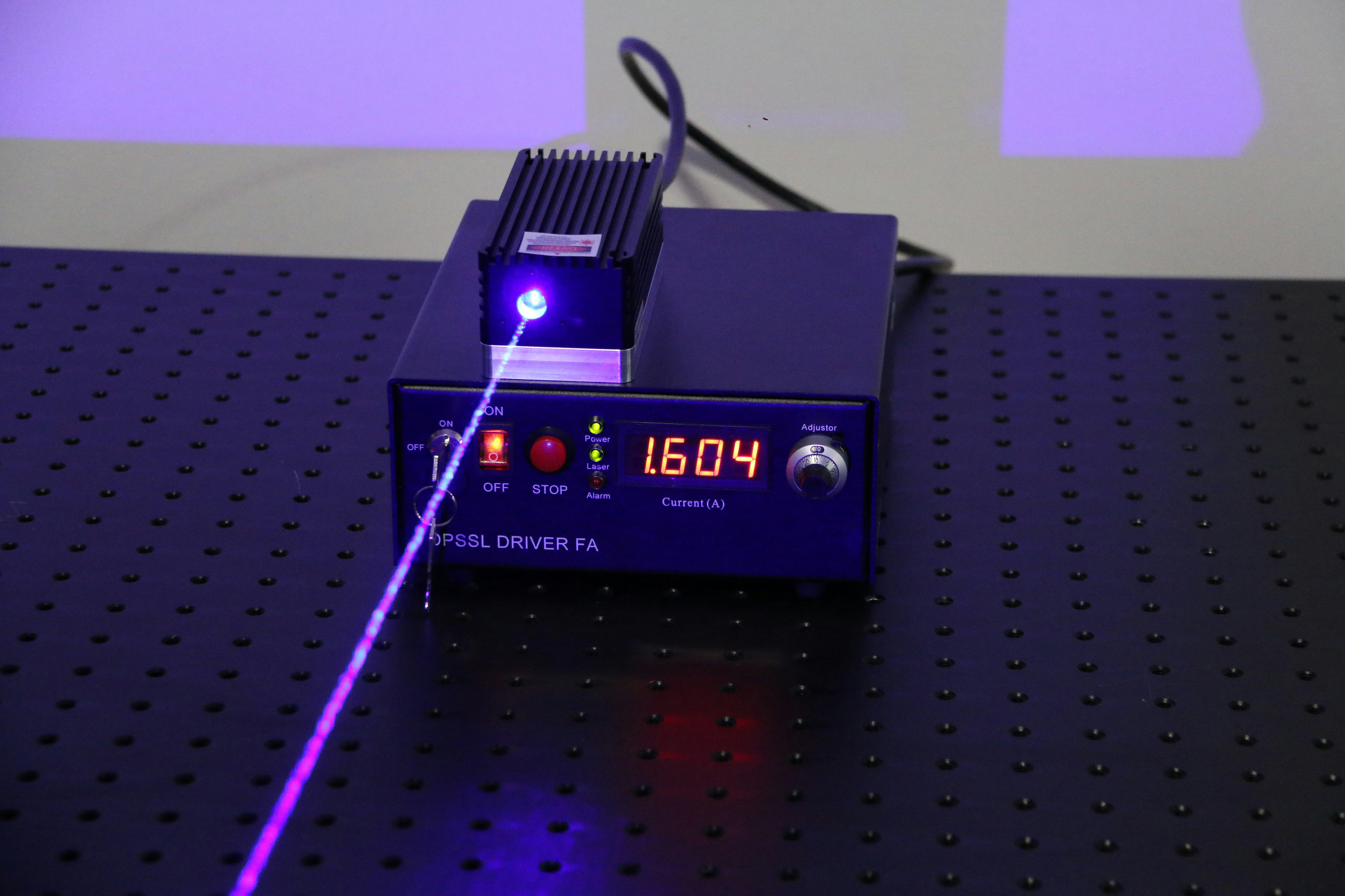 laser optical setup on floating optical table quantum laboratory