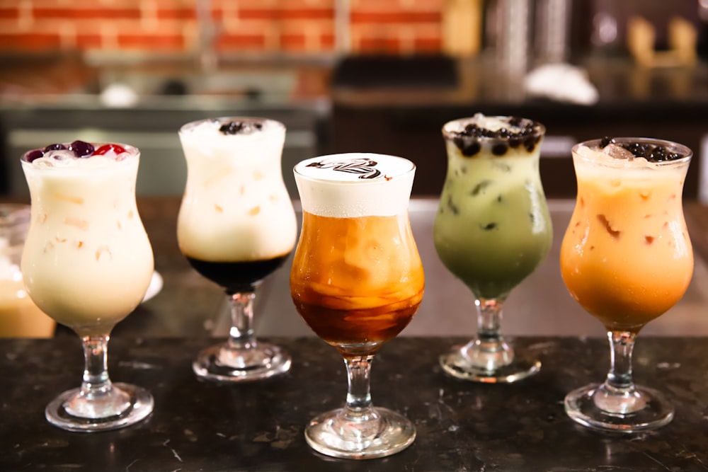 five assorted-flavor drinks