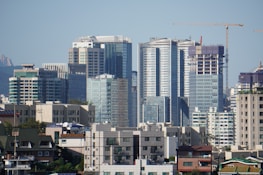 City skyline with high-rise buildings representing real estate investment opportunities.