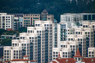 A lively neighborhood in Chandigarh showcasing modern homes and office buildings.