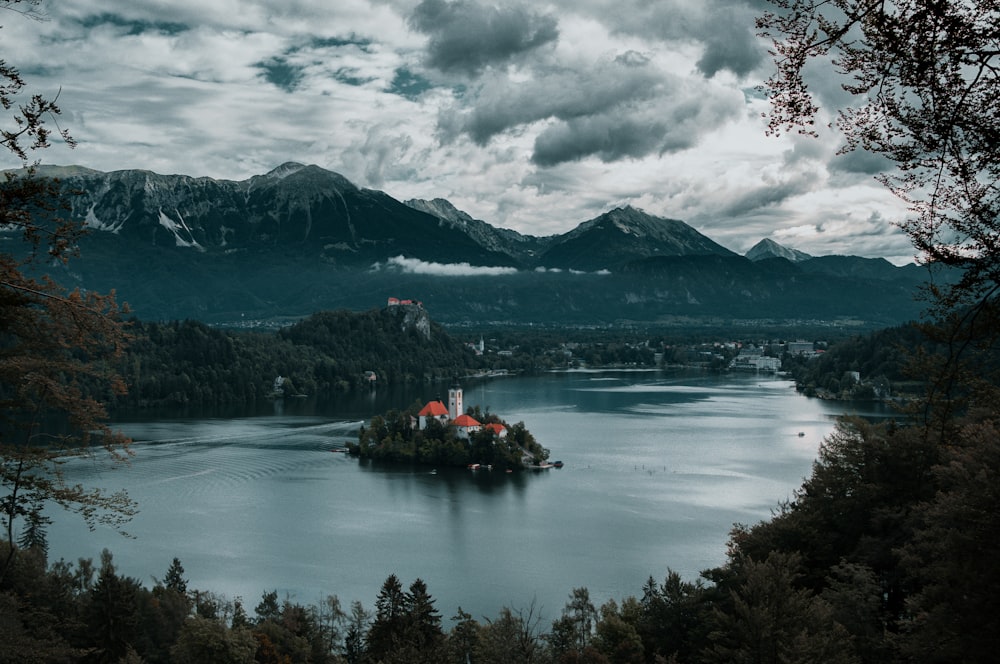 building on islet surrounded by calm water of river