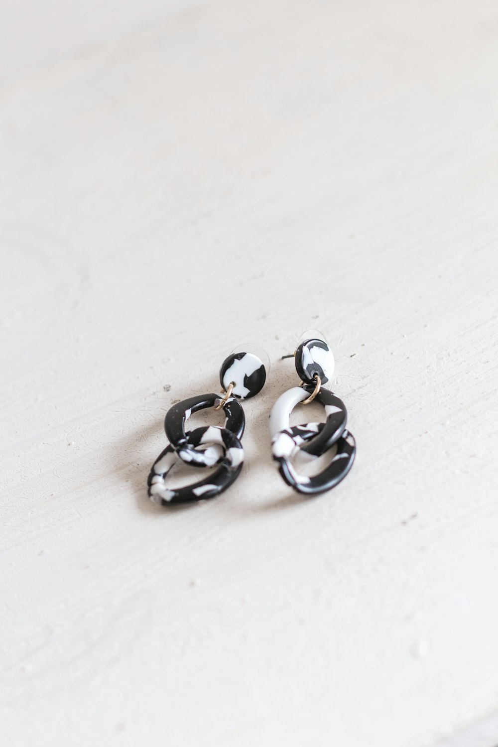 pair of black drop earrings