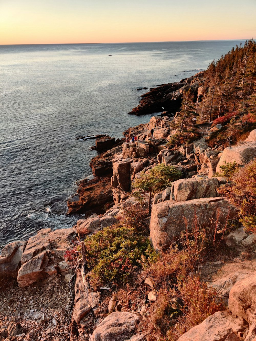 rock formation beside sea