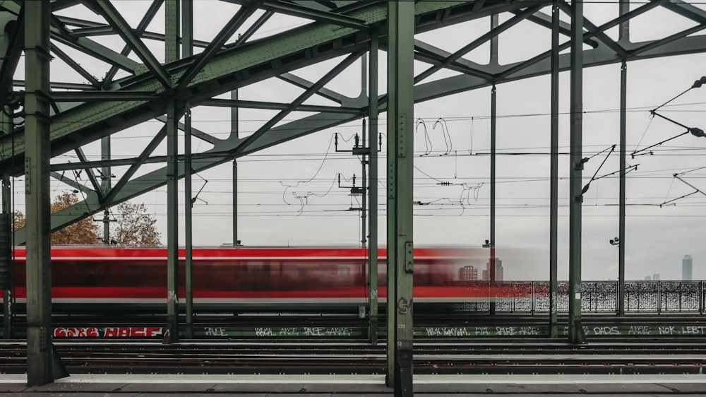 timelapse photo of red train