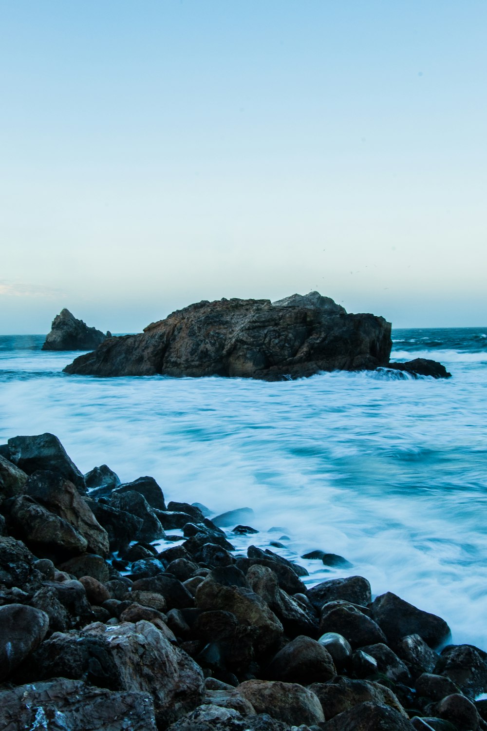 sea beside rock formation