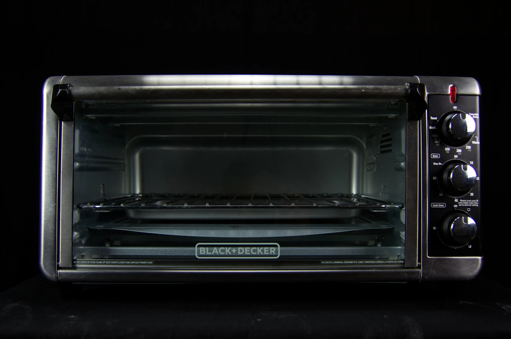 Cookware and cooking utensils arranged in a practical modern kitchen