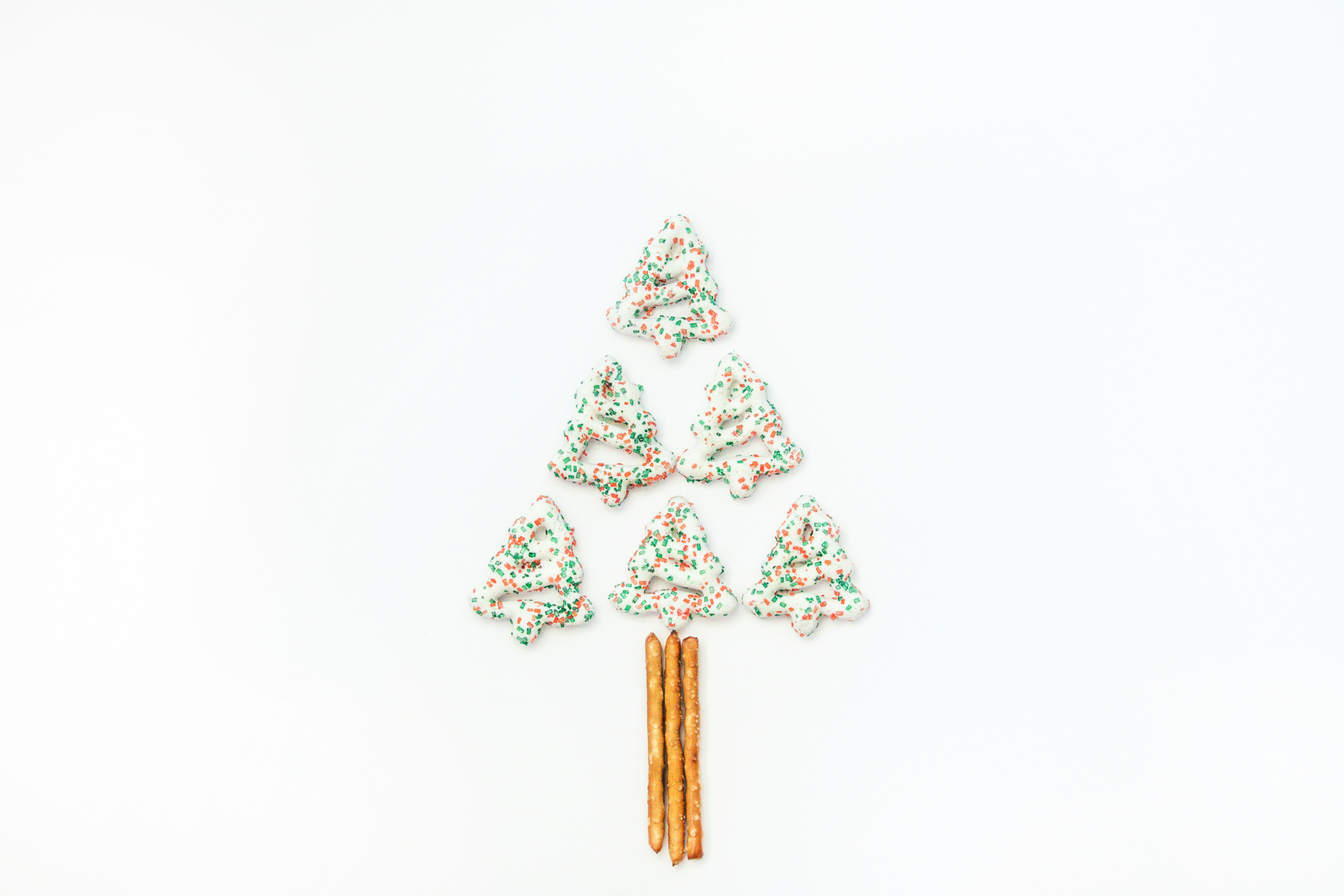 a small christmas tree made out of candy canes