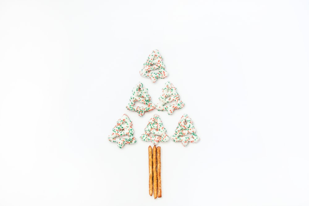 a small christmas tree made out of candy canes