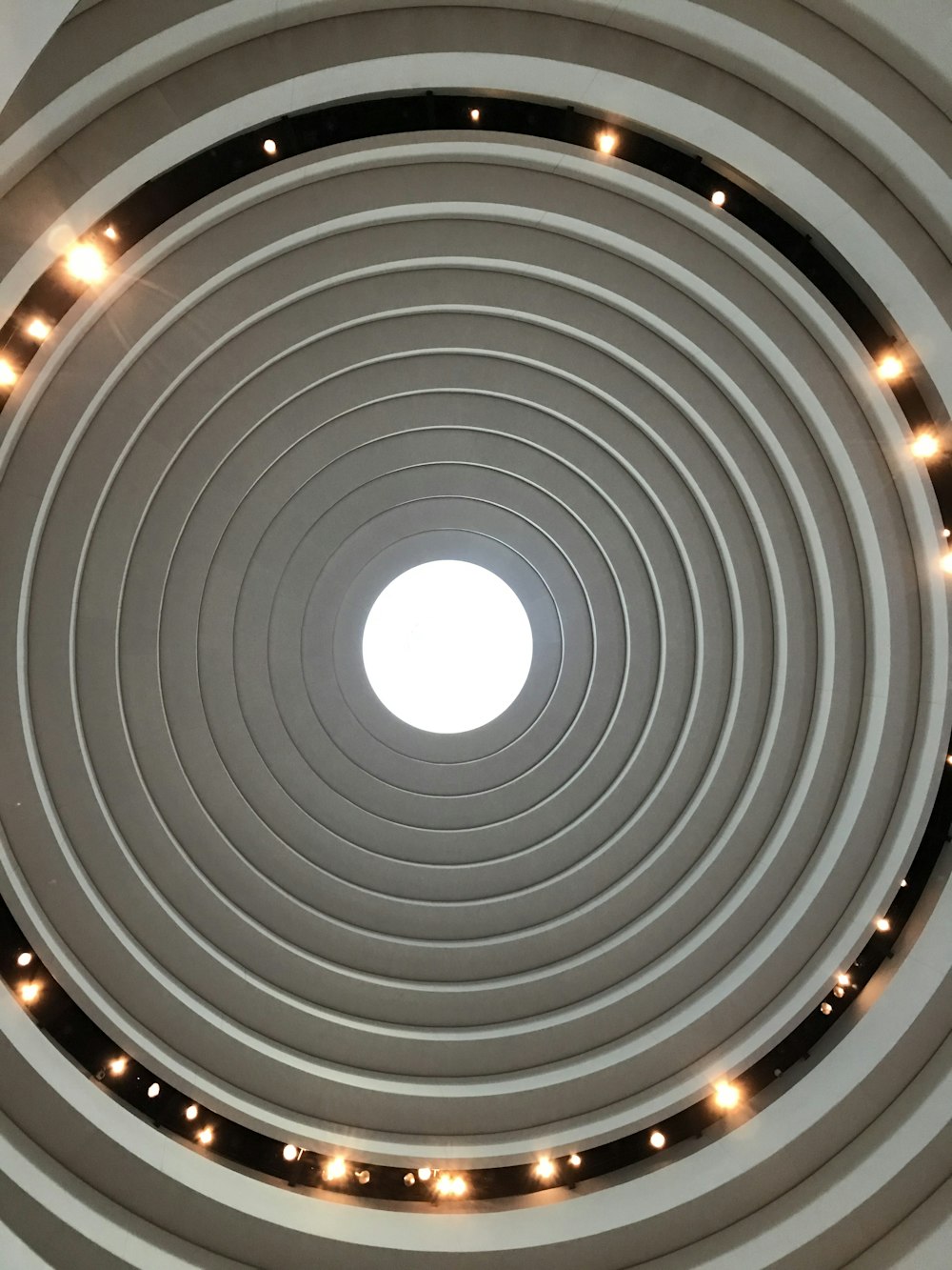low angle photography of round ceiling