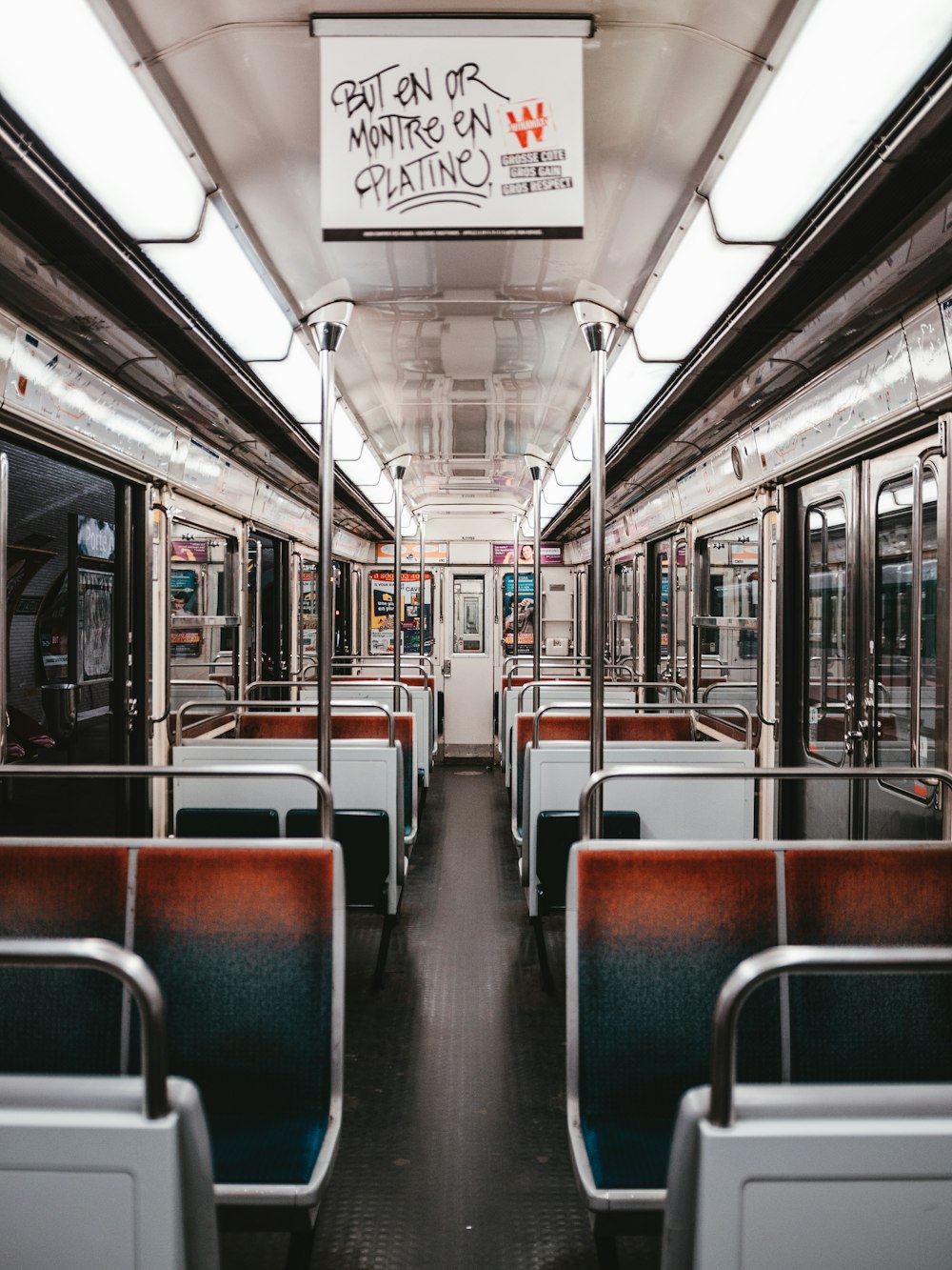 brown and teal subway train seats