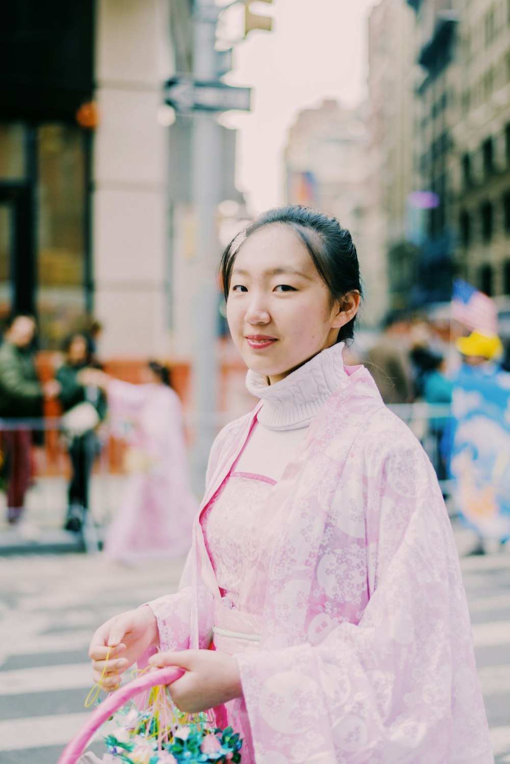 selective focus photo of woman holding basket