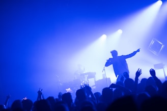 man standing in front of people