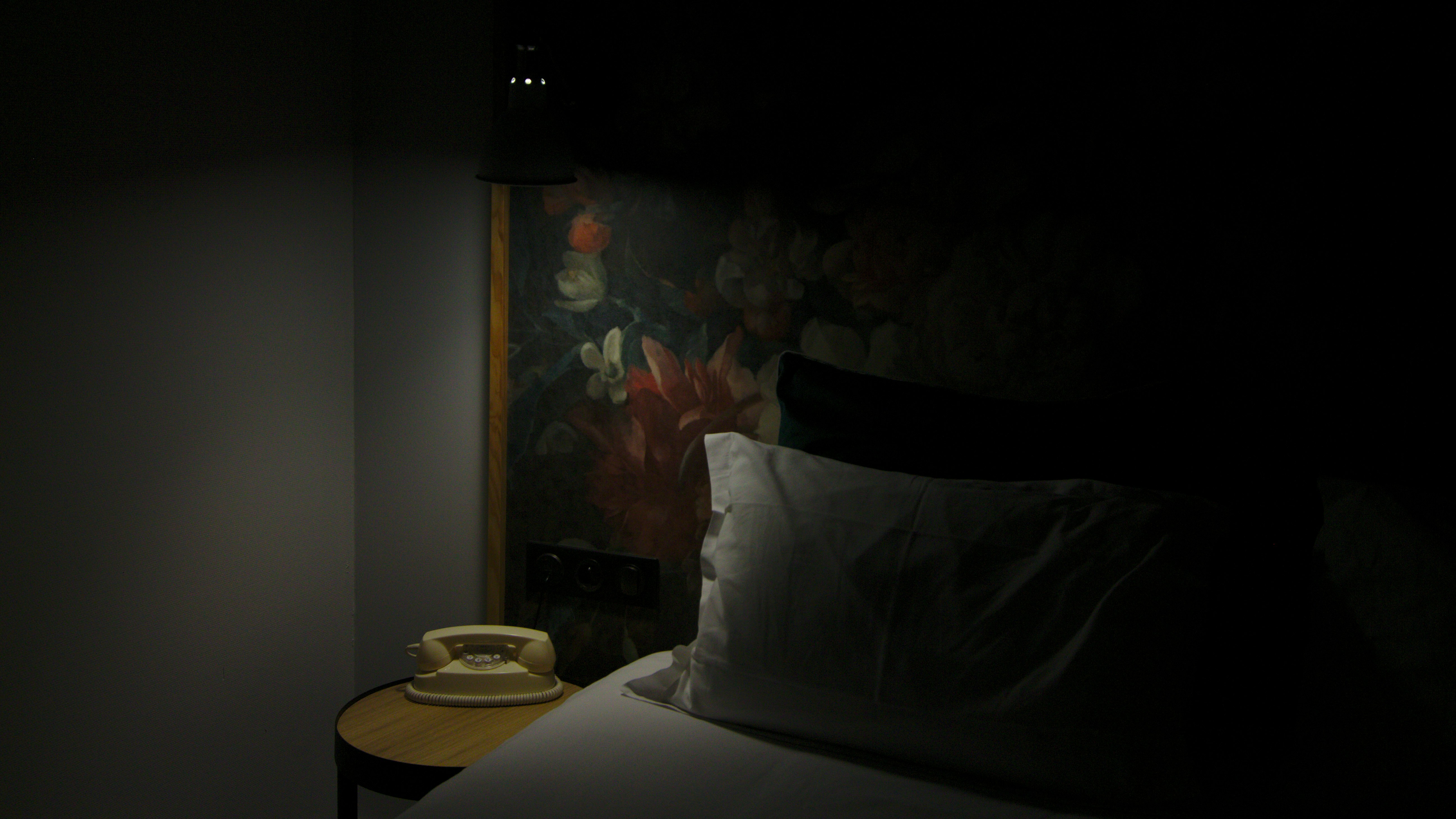 low-light photo of bed room