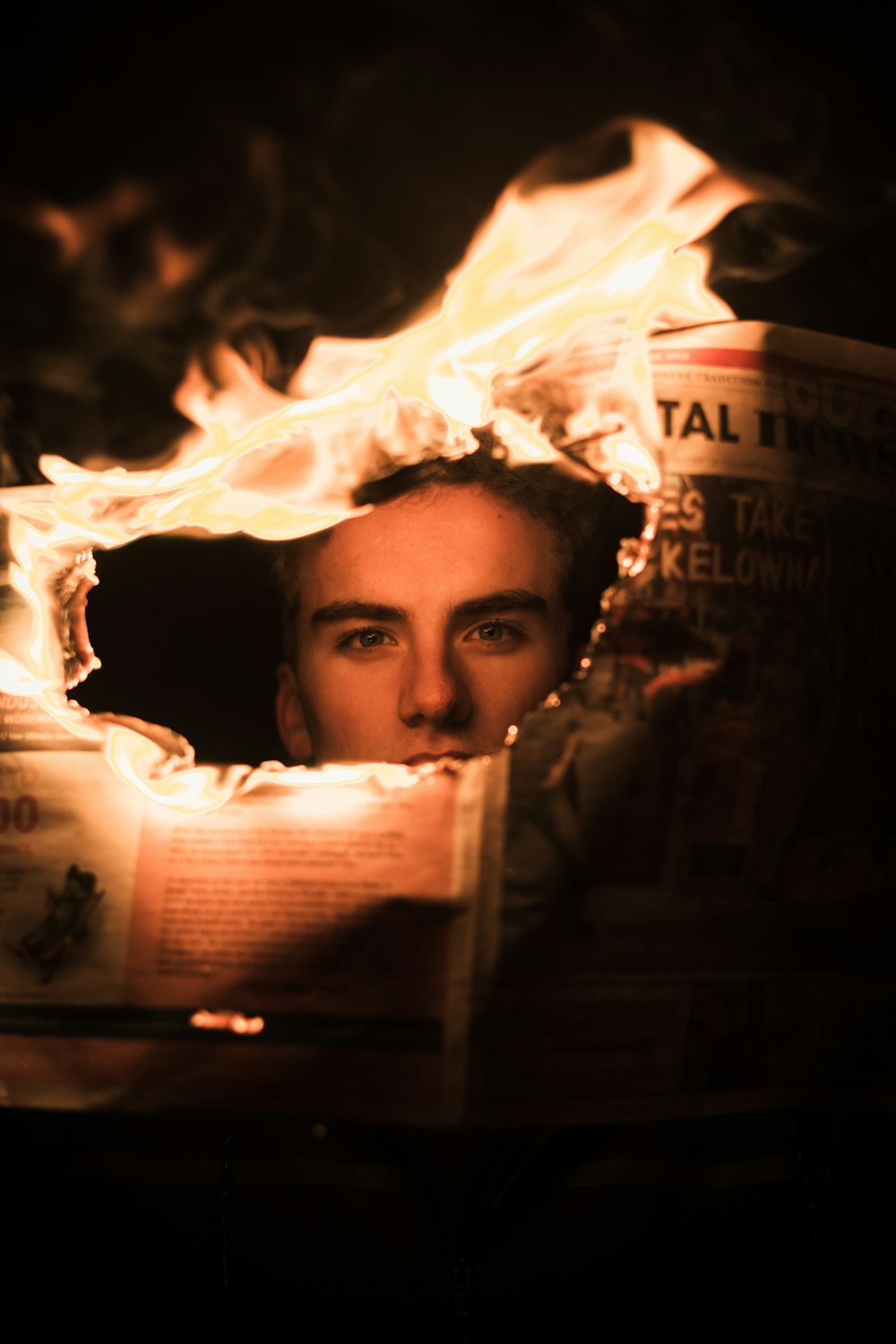 man holding newspaper