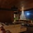 A warm, inviting room with soft lighting and comfortable seating for consultation.