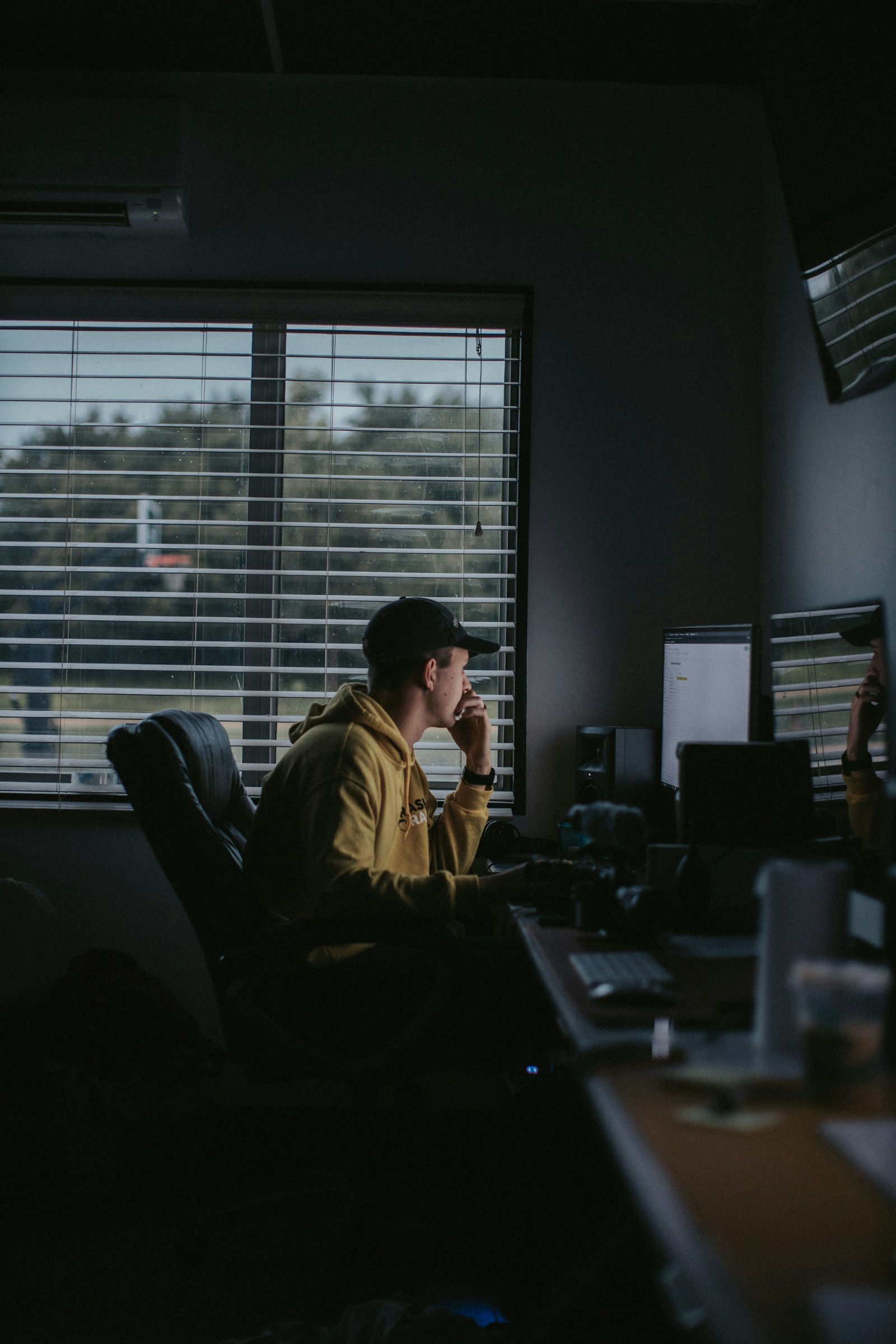 Canon EF 50mm F1.2L USM sample photo. Man sitting on chair photography