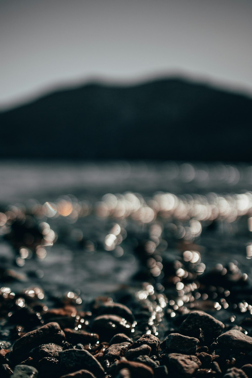 stones on body of water