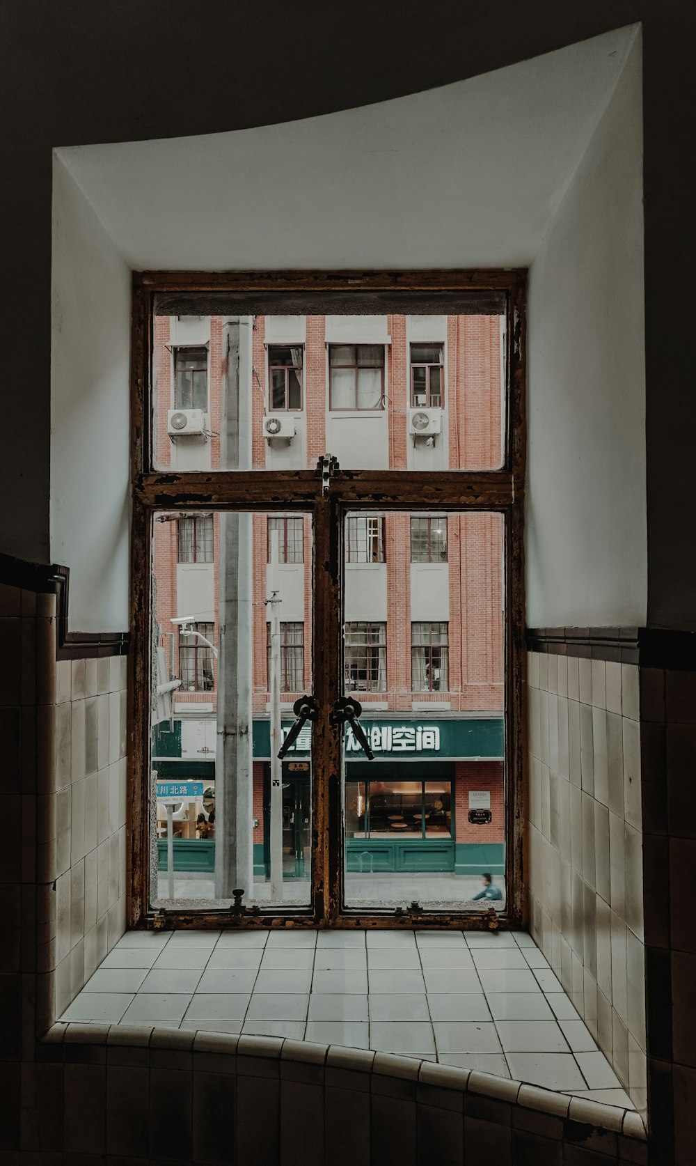 brown-framed glass door
