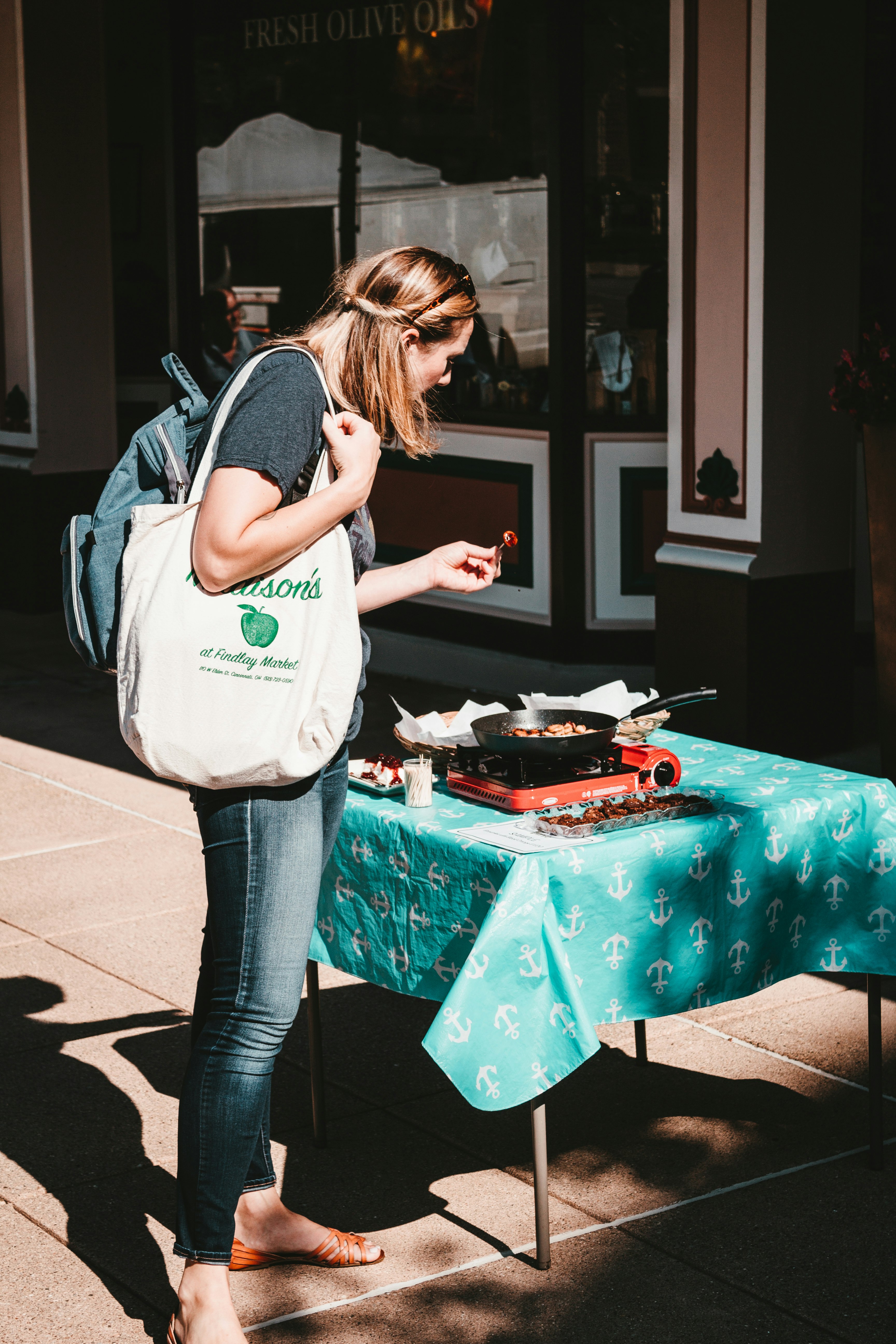 woman cooking food outside