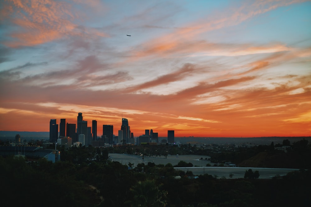 photograph of city during sunset