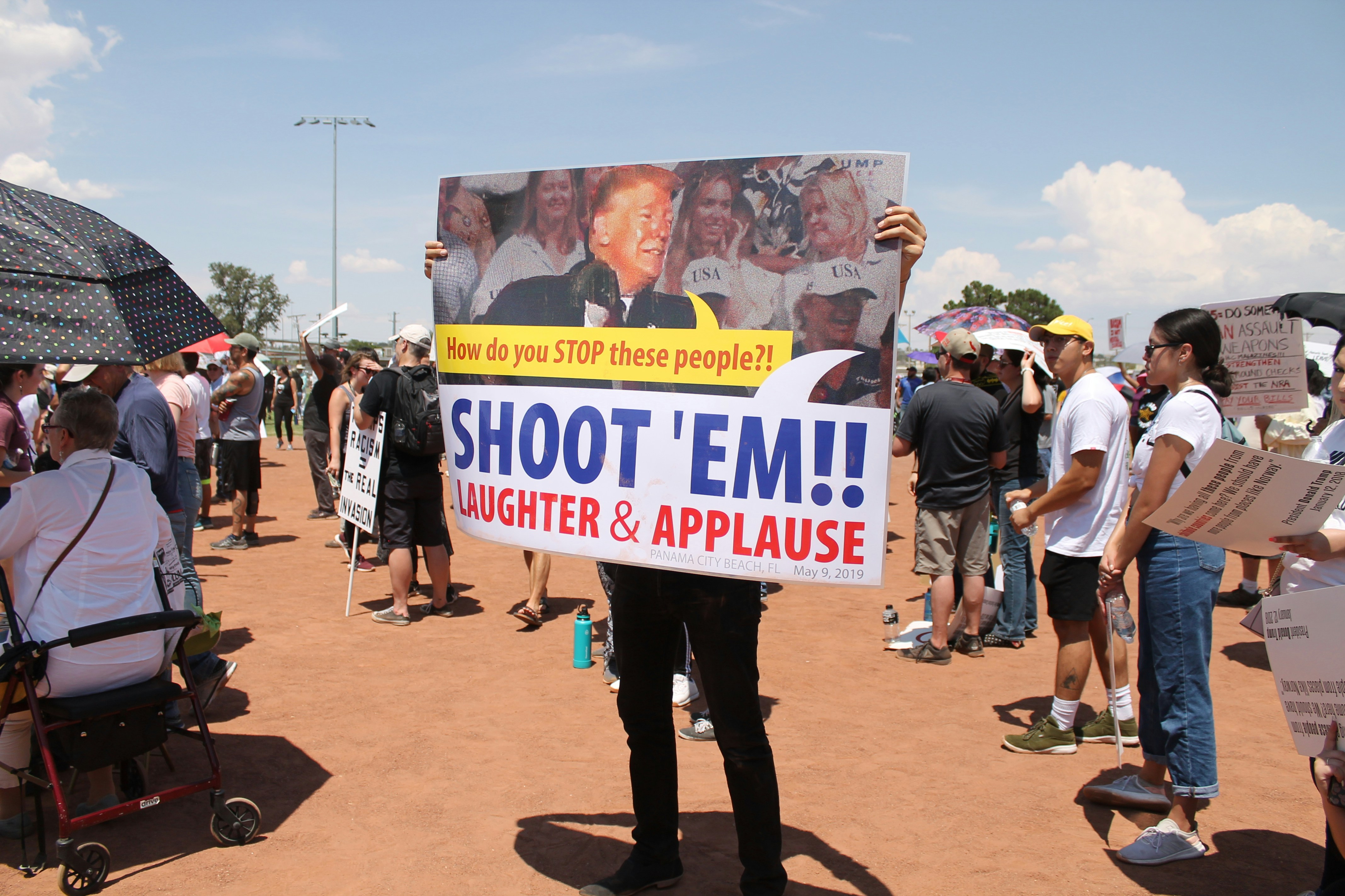 man holding banner