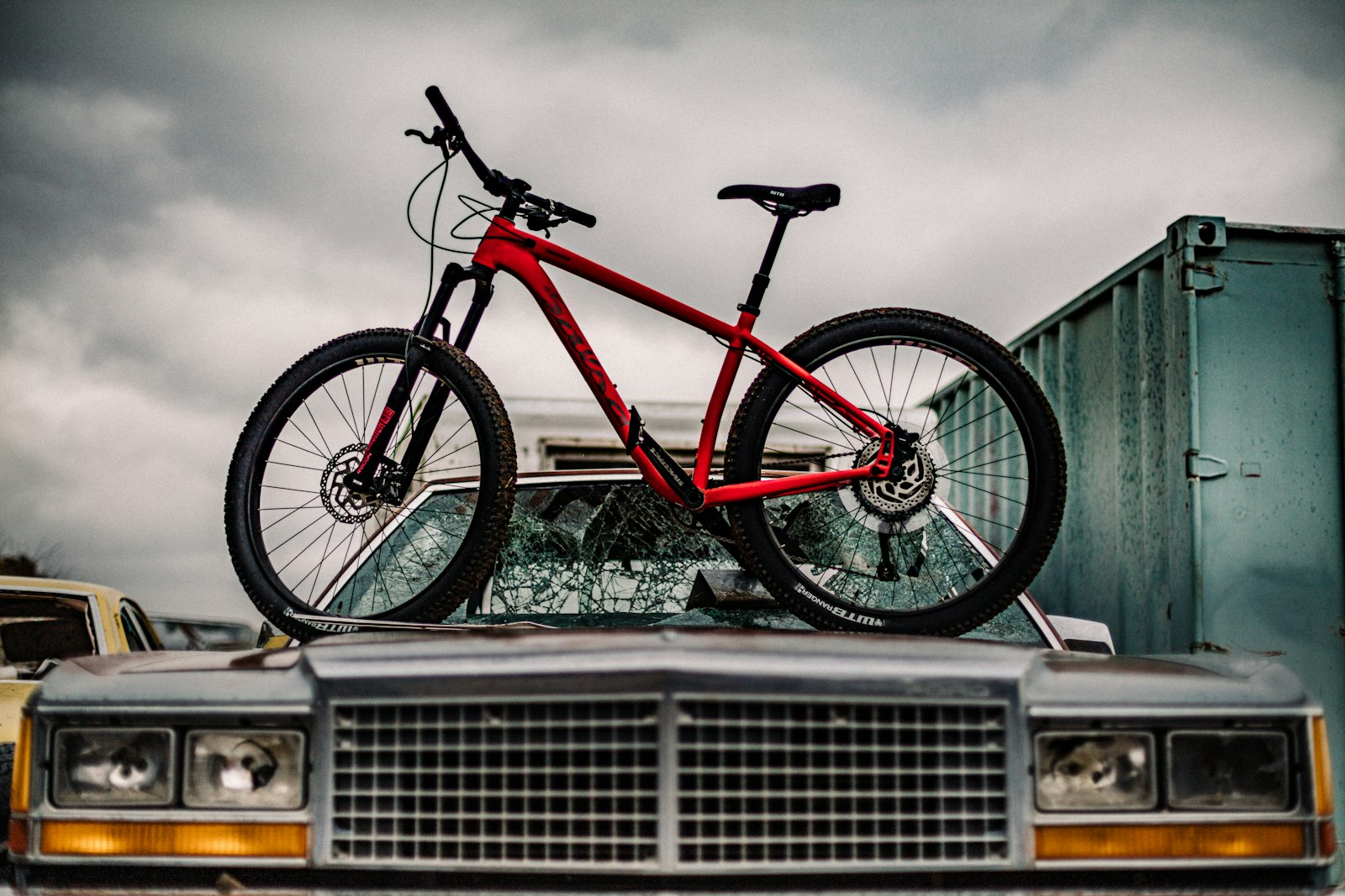 Canon EOS 5DS + Canon EF 50mm F1.4 USM sample photo. Red bike on car photography