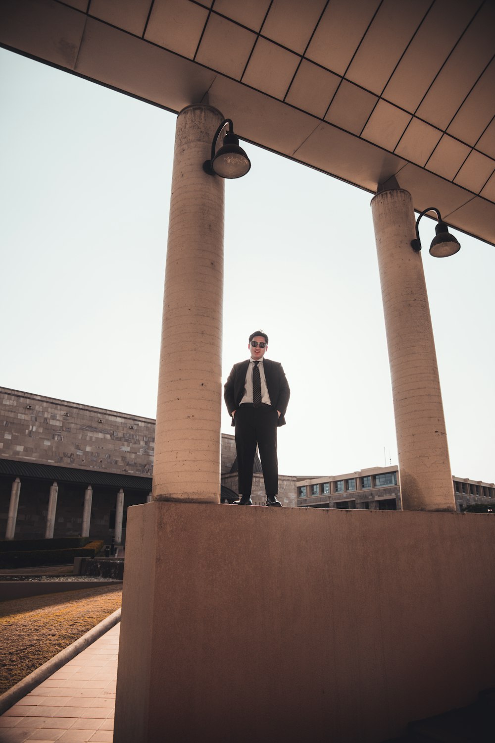 man standing on wall