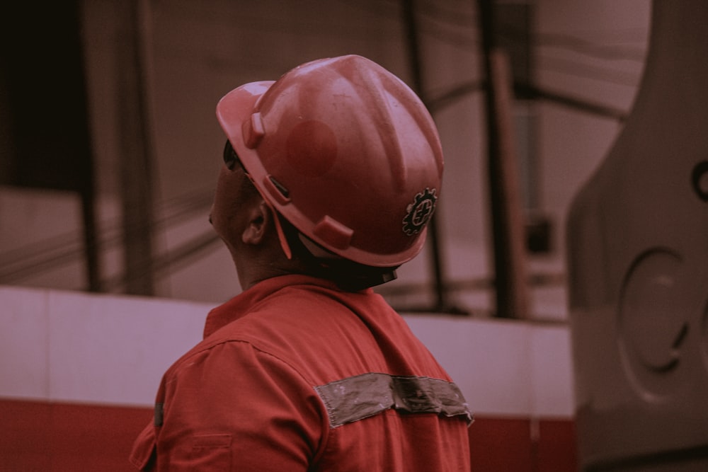 man wearing red hat