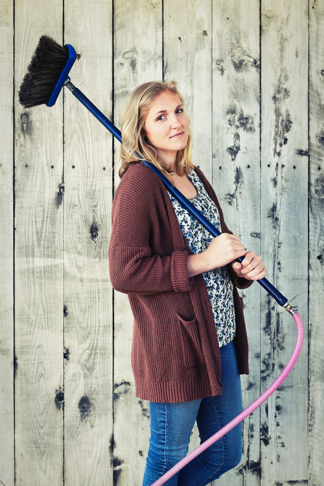 woman holding mop