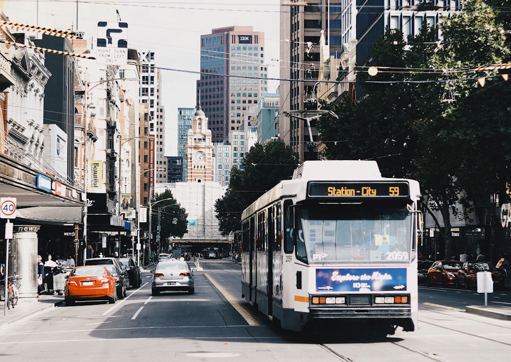 white cable bus on road