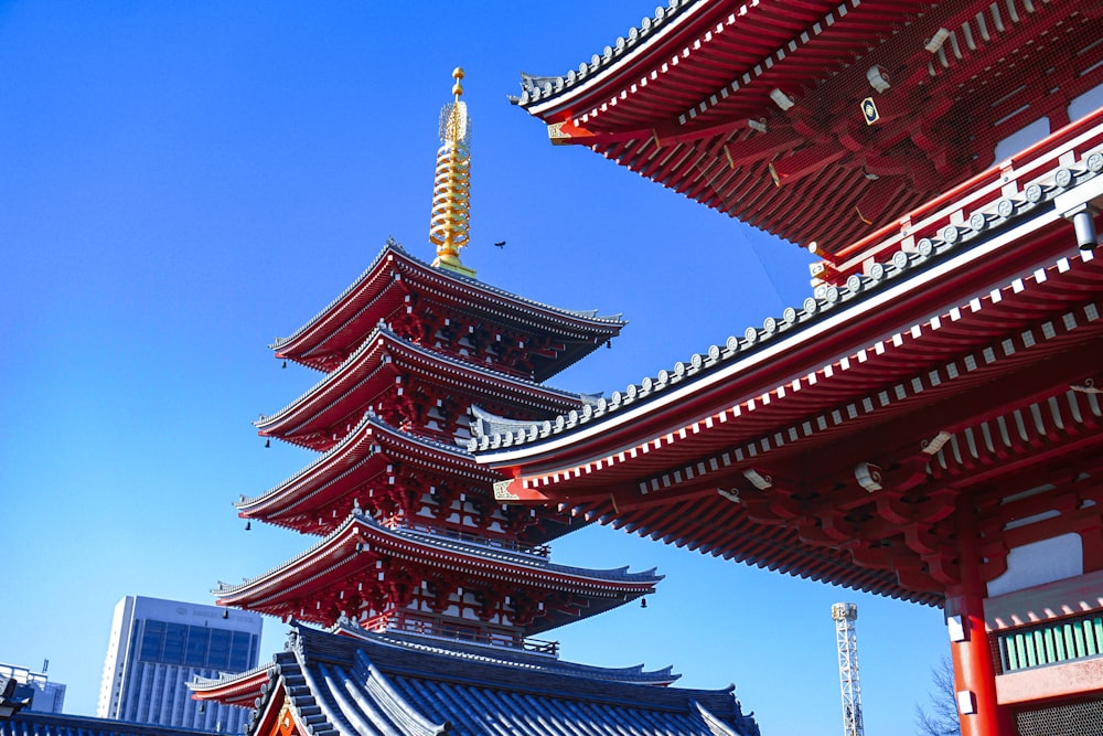 low angle photo of red temple