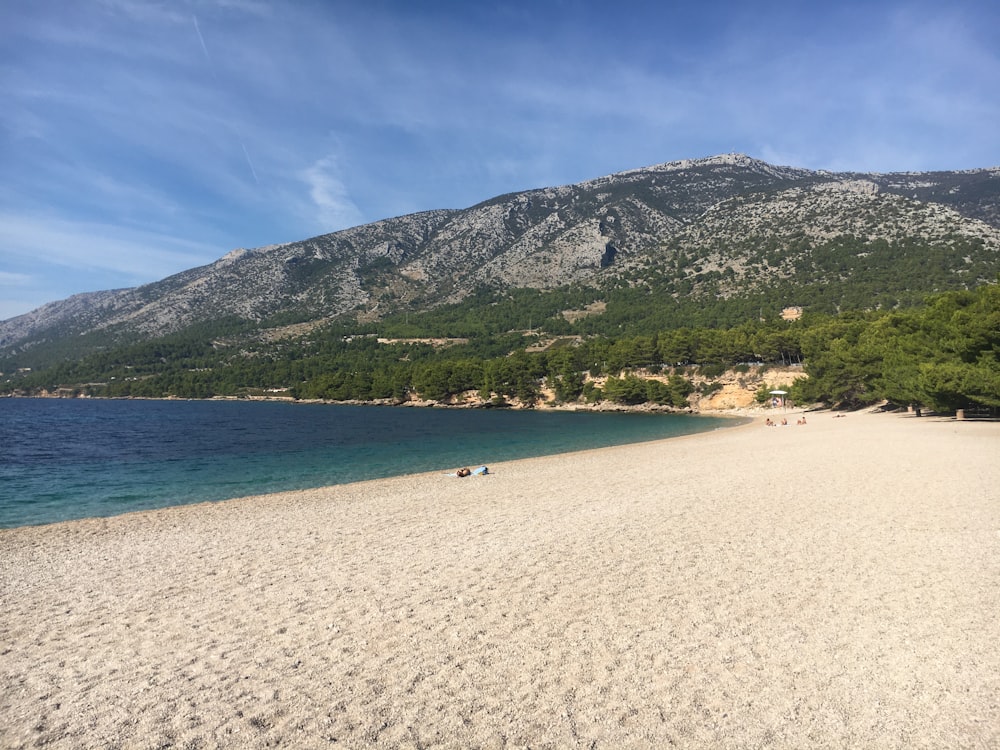 sea beside mountains