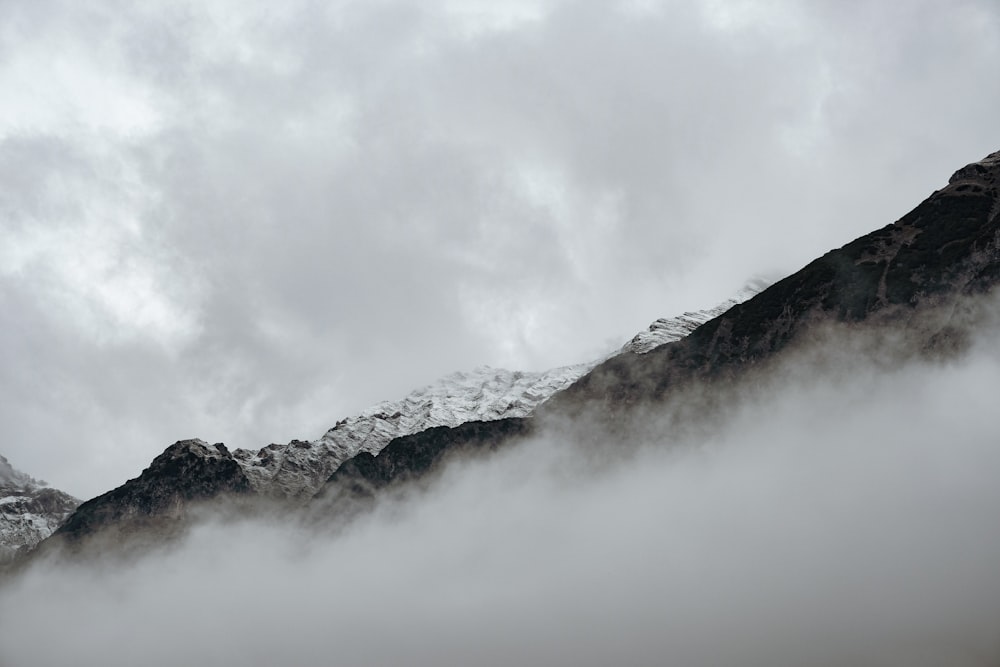 mountains surrounded with fogs