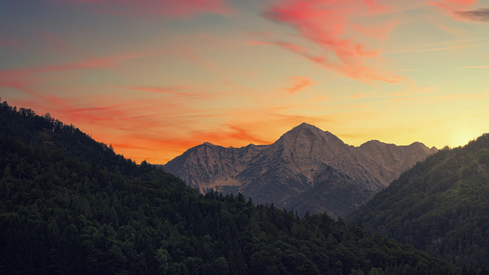 Mountain range glowing during golden hour