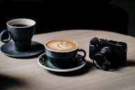 A relaxed moment with coffee cups on a small table amidst the creative recording setup.