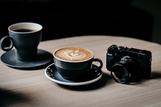 A relaxed moment with coffee cups on a small table amidst the creative recording setup.