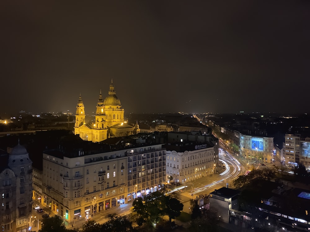 wide-angle photography of buildings during nighttime