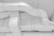 A network of industrial ventilation ducts with a clean, white surface. The ducts are arranged in a curving pattern, highlighting their geometric form. Metal fasteners and joints are visible along the edges, contributing to a sleek, industrial aesthetic.