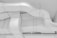 A network of industrial ventilation ducts with a clean, white surface. The ducts are arranged in a curving pattern, highlighting their geometric form. Metal fasteners and joints are visible along the edges, contributing to a sleek, industrial aesthetic.