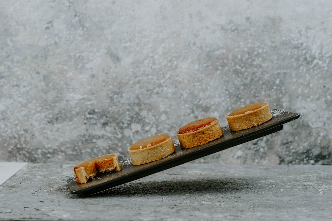 four round dessert on rectangular tray