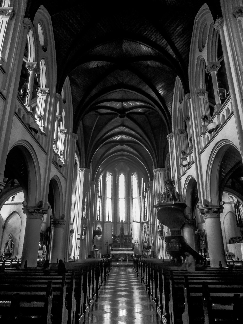 grayscale photo of cathedral interior