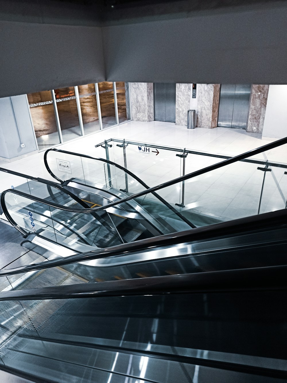 top-view photography of two escalators
